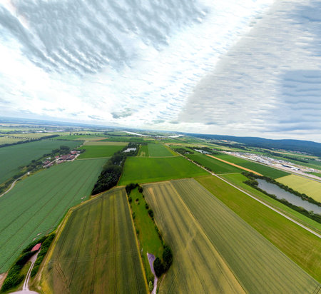 Aerial view of an agricultural field with grain planted in spring in Bavaria