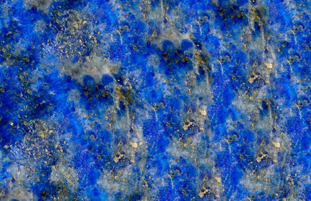 Quartz with mineral inclusions in the studio in front of black background photographed in marco mode
