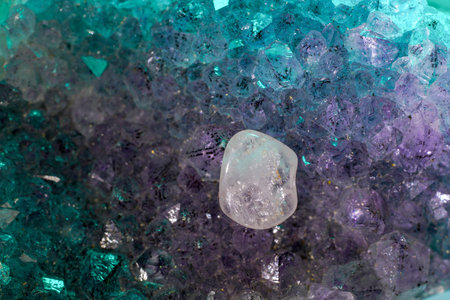 Quartz with mineral inclusions in the studio in front of a background photographed in Marco mode
