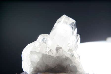 Quartz with mineral inclusions in the studio in front of a background photographed in Marco modeの写真素材