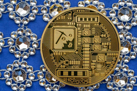 Bitcoin coin, medal photographed in the studio with long exposure reflectionの写真素材