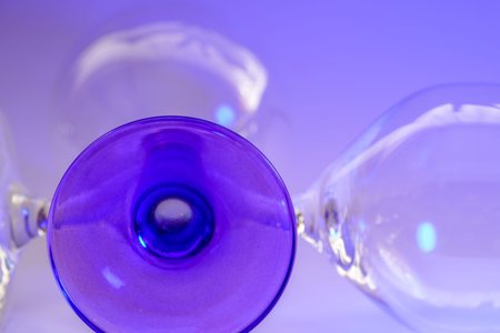 Glass made of crystal-like materials photographed in the studio with colorful background