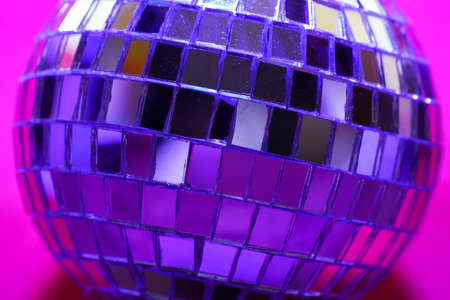 Disco ball with colored flash foils photographed in the studioの写真素材