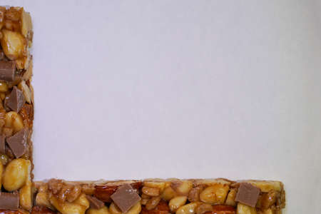 Bar sweet with nuts and caramel photographed in the studioの写真素材