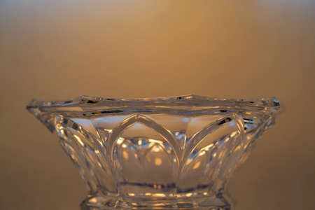Glass made of crystal-like materials photographed in the studio with colorful backgroundの写真素材