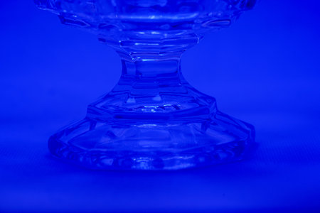 Glass made of crystal-like materials photographed in the studio with colorful backgroundの写真素材