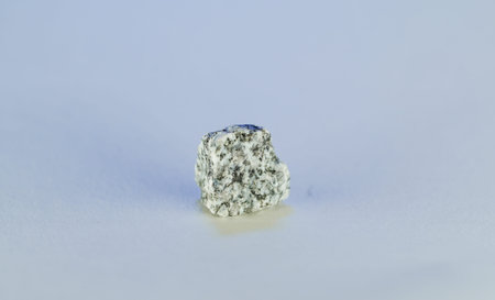 Granites are coarsely crystalline plutonic rocks (plutonites) rich in quartz and feldspar, but also contain dark minerals, mainly mica, photographed in the studioの写真素材