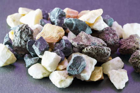 Granites are coarsely crystalline plutonic rocks rich in quartz and feldspar, but also contain dark minerals, mainly mica, photographed in the studioの写真素材