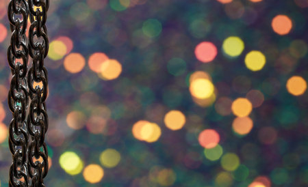 Silver chain for costume jewelry as a background image with copy space photographed in the studioの写真素材