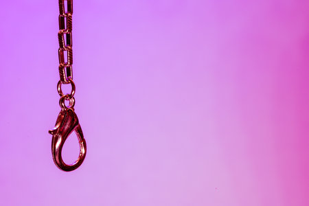 Silver chain for costume jewelry as a background image with copy space photographed in the studioの写真素材