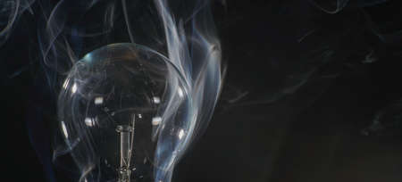 Smoke photographed in the studio with copy space and backgroundの写真素材