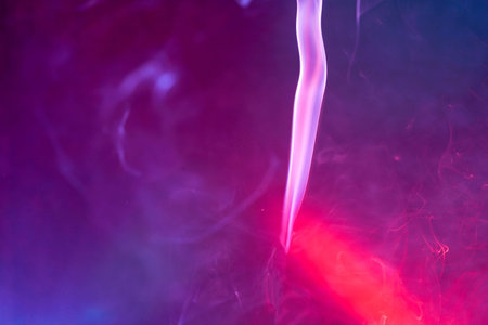 Smoke photographed in the studio with copy space and backgroundの写真素材