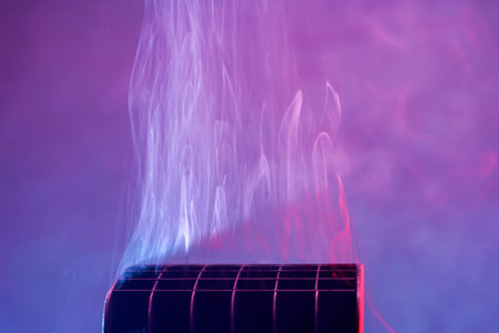 Smoke photographed in the studio with copy space and effect background