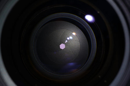 old photo camera with bellows and lens in detail