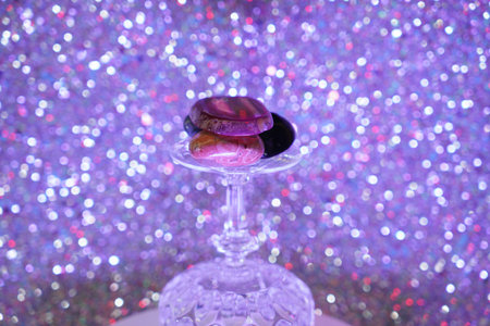 Glass made of crystal-like materials photographed in the studio with colorful backgroundの写真素材