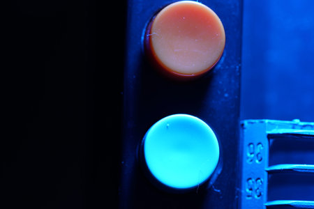Close-up of a blue eye shadow palette on a black background
