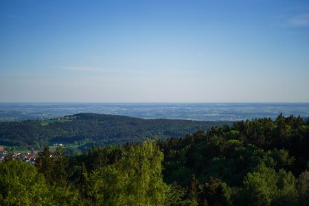 View from the top of the mountain to the valley and the forestの写真素材