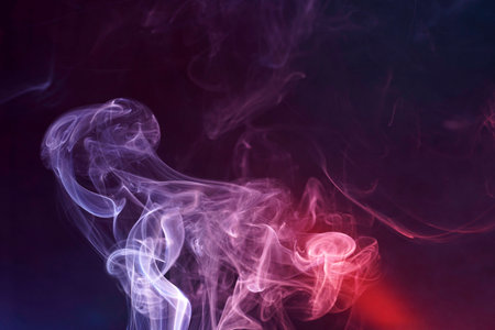 Abstract smoke moves on a black background. Background from the smoke of vapeの写真素材