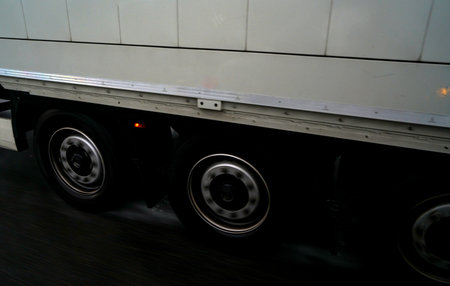 Close up of the wheels of a modern semi-trailer truckの写真素材