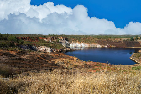 Volcanic landscape with lake and blue sky in Sicily, Italy