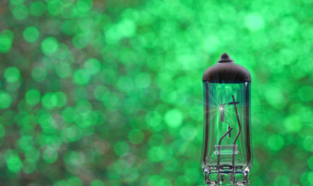 lamp on abstract green bokeh background with copy space.
