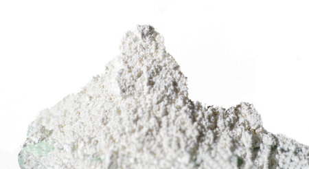 Close-up of a pile of salt isolated on a white background