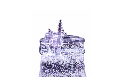 Close-up of a bottle of water isolated on white background.の写真素材