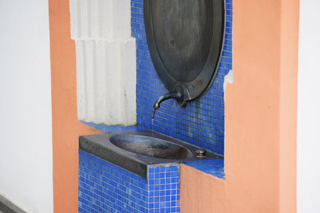 ceramic washbasin in a public place, closeup of photoの写真素材