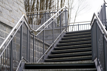Staircase with metal railings in the park. Close up.