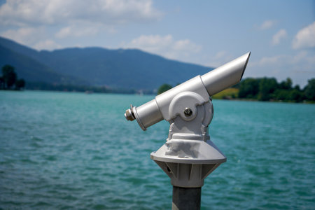 Coin operated binoculars on the edge of a lake in Switzerlandの写真素材