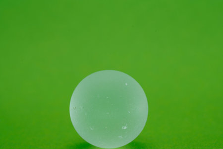 green background with crystal quartz crystals is a beautiful background and an abstract, macroの写真素材