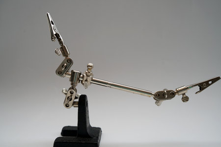 Close-up of a scale made of metal on a white backgroundの写真素材