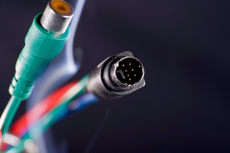 Close up of a USB cable with a plug on a black background