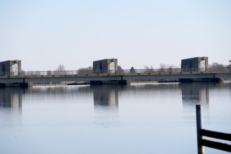 A view of the bridge across the river in the winter season.の写真素材