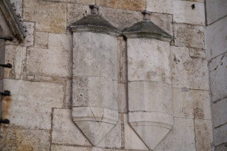 Medieval heraldic shield on the stone wallの写真素材