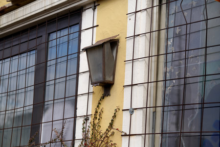 lamp on the facade of a building, closeup of photoの写真素材