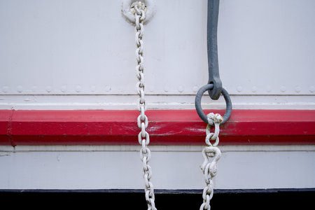 anchor and anchor chain in the harbor of a fishing boat