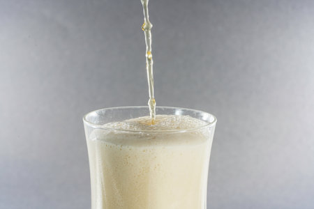 Beer with foam for drinking photographed in the studioの写真素材