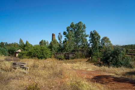 Abandoned village of a former copper and iron mine with poisoned earth and waterの写真素材