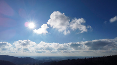 blue sky with white clouds and sun. panoramic view.の写真素材