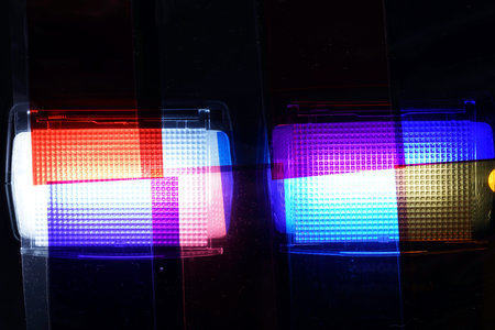 Flash of a camera with multicolored colorful foils photographed in studioの写真素材