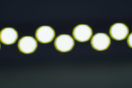 Colored photo background photographed out of focus with lens flares as a studio shotの写真素材