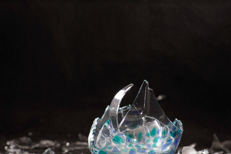 Broken glass photographed in the studio with black background,の写真素材