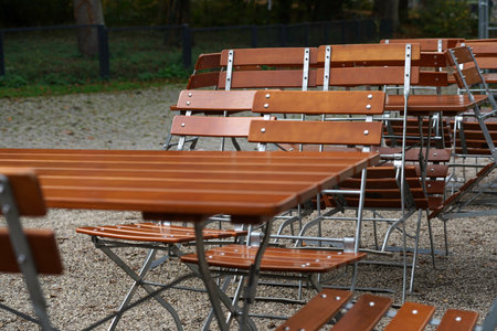 comfortable seats and tables in the park to relaxの写真素材