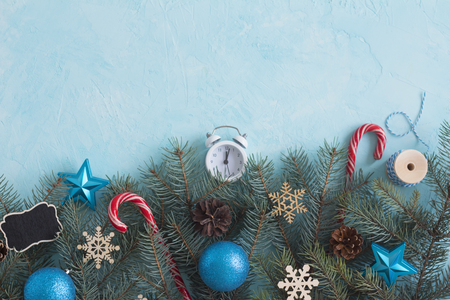 Christmas objects on the blue background top view. Christmas backgroundの写真素材