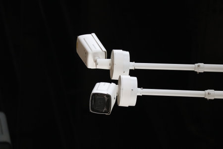 CCTV camera isolated on black background with clipping path for security conceptの写真素材