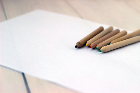 Color pencils on white paper, concept of drawing, close upの写真素材