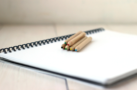 Color pencils on sketchbook, concept of drawing, close upの写真素材