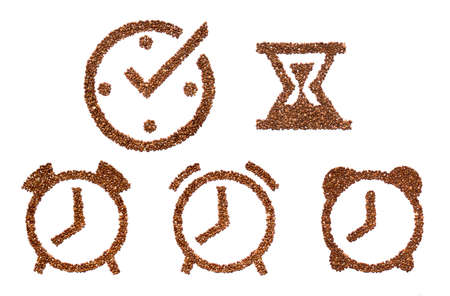 Porridge buckwheat in the form of alarm clock. healthy eating time, food conceptの写真素材