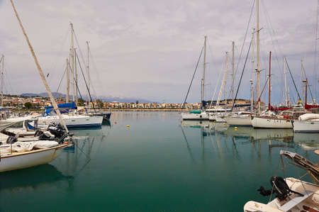 RETHYMNO, THE CRETE ISLAND, GREECE - MAY 30, 2019: The yachts in the harbor of Rethymnon.のeditorial素材